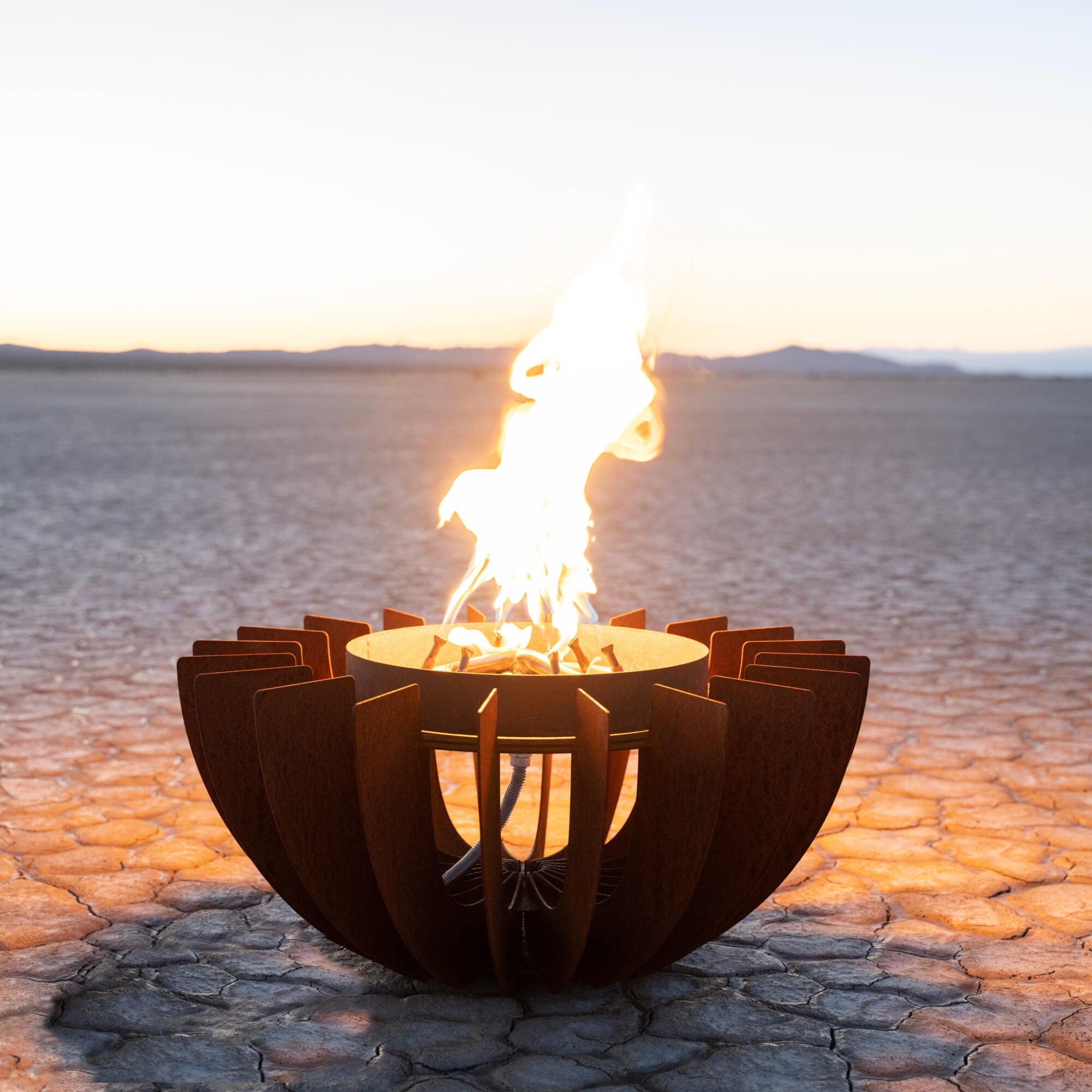 Manufacturer photograph of The Outdoor Plus Galaxy Corten Steel Fire Sculpture - 24 to 36 Inch