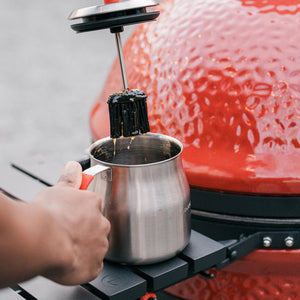 Kamado Joe Krafted Steel basting pot with sauce