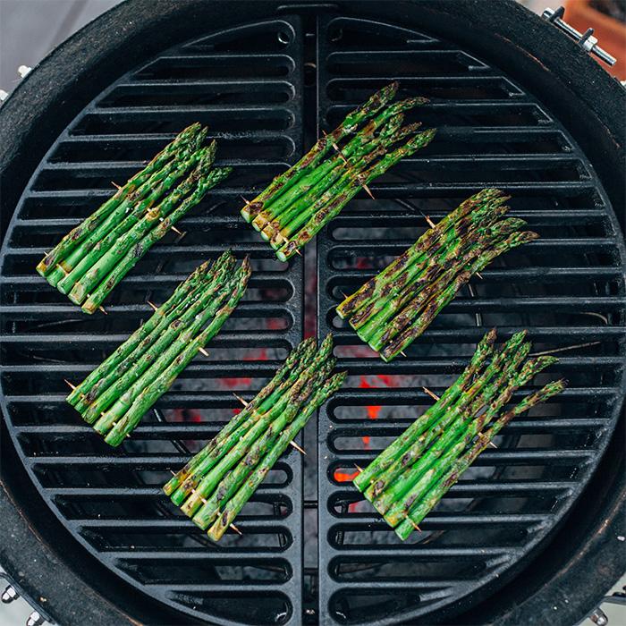 Kamado Joe half-moon cast iron grate in use