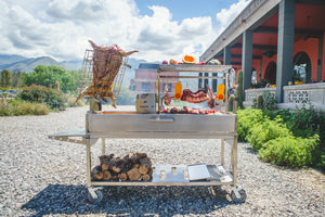 Large outdoor grill with meat -smokeforges