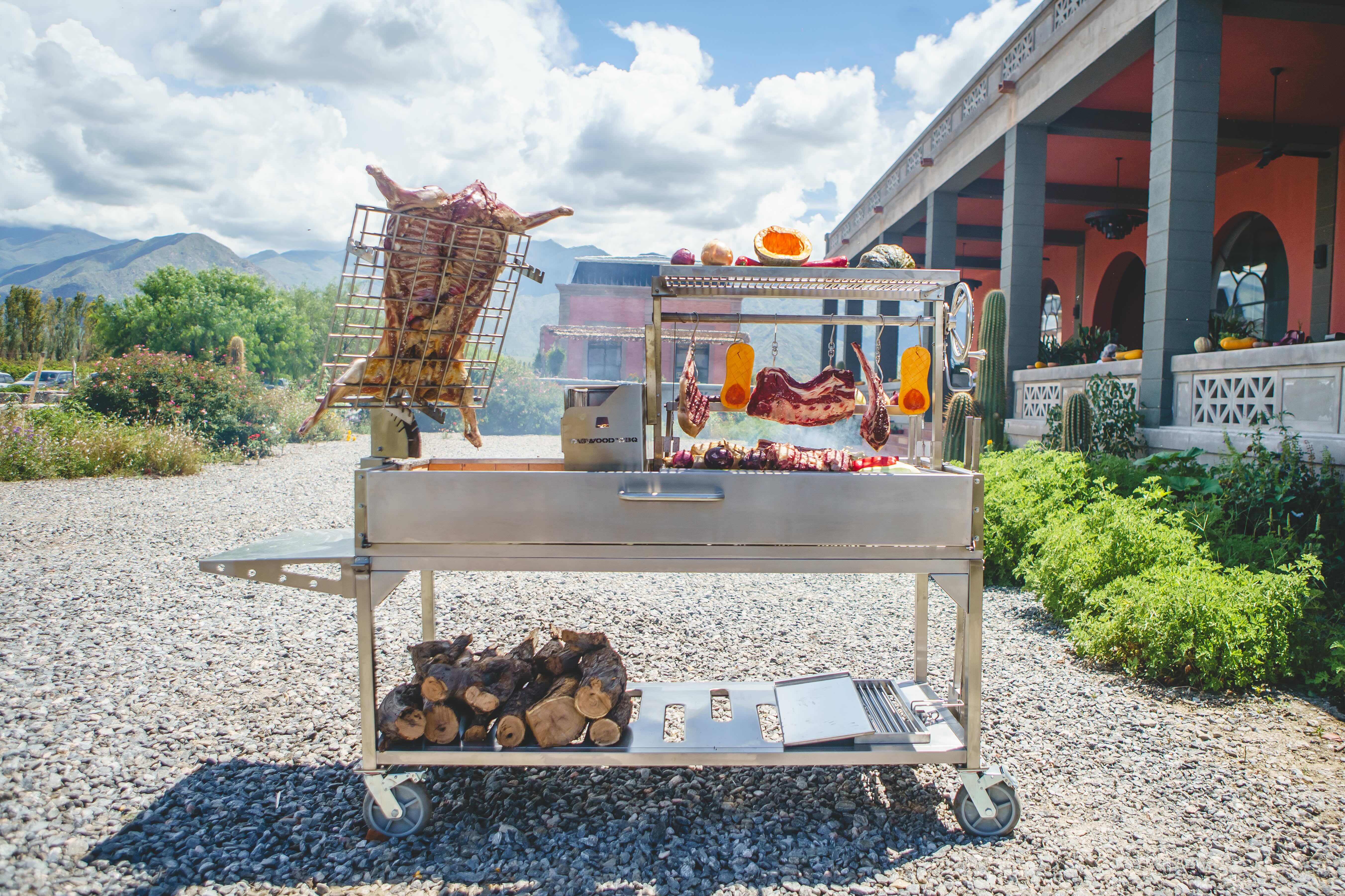 Large outdoor grill with meat -smokeforges