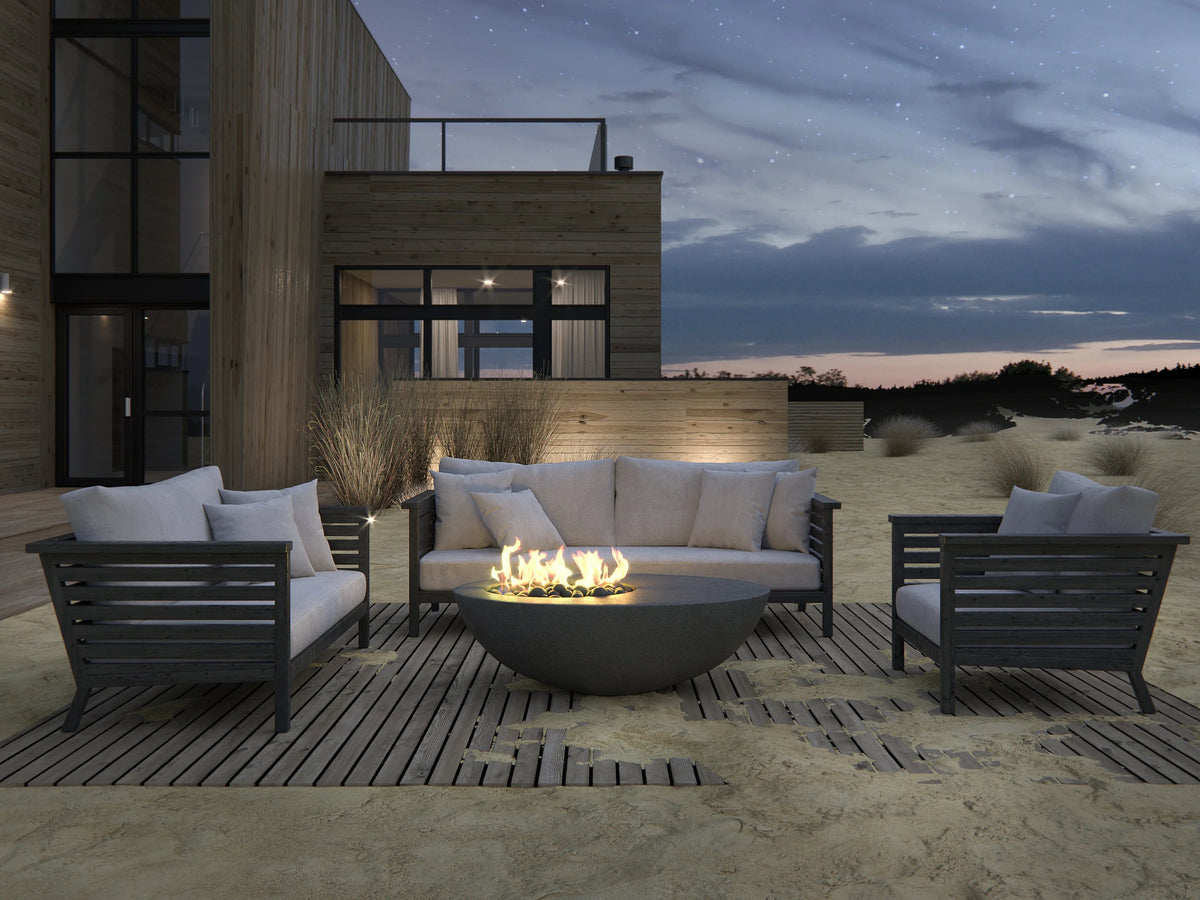 Studio Nisho Nyx GFRC fire feature installed in an outdoor setting