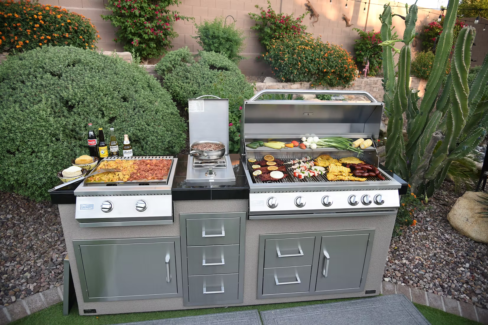 Real lifestyle cover image for the KoKoMo Professional Series 40 inch built-in gas grill in a premium outdoor kitchen