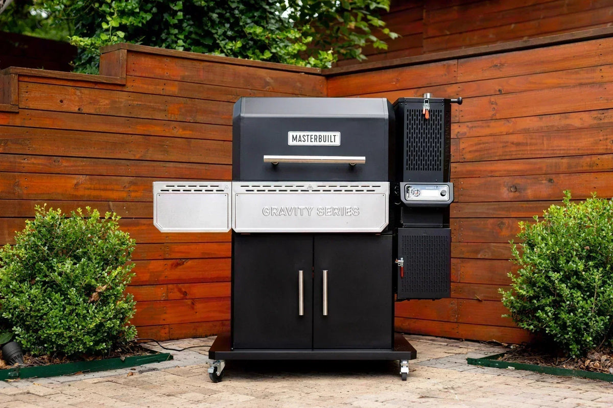 Masterbuilt Gravity Series 1150 on an outdoor paved patio