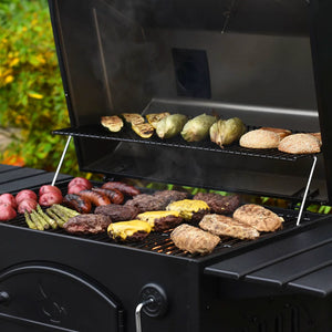 Char-Griller Traditional E2197 charcoal grill cooking food