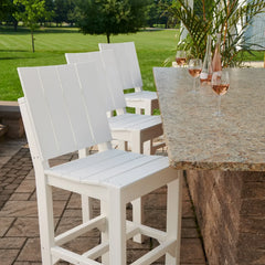 Luxcraft White Urban side chairs at an outdoor table
