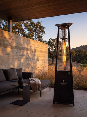 Lava Heat Italia 2G Flame Tower patio heater in Hammered Black - outdoor setting