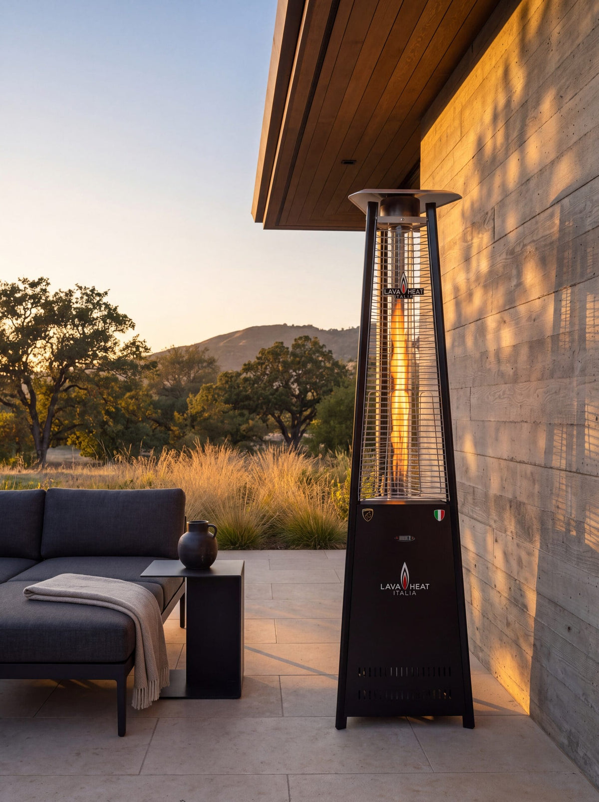Lava Heat Italia 2G Flame Tower patio heater in Hammered Black - outdoor setting