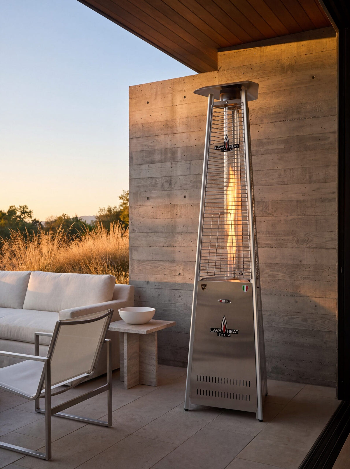 Lava Heat Italia 2G Flame Tower patio heater in Stainless Steel - outdoor setting