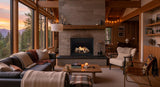 Majestic Meridian 42 gas fireplace with reflective black glass, birch logs and Ventura front