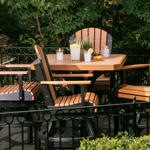 Luxcraft 41-inch square table and chairs beside a garden