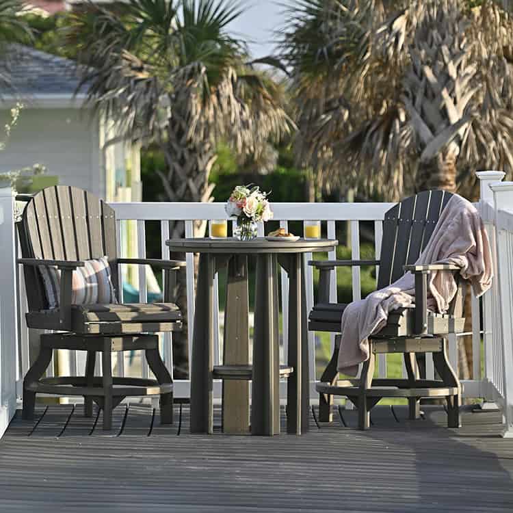 Luxcraft Balcony Table with counter-height chairs on a deck