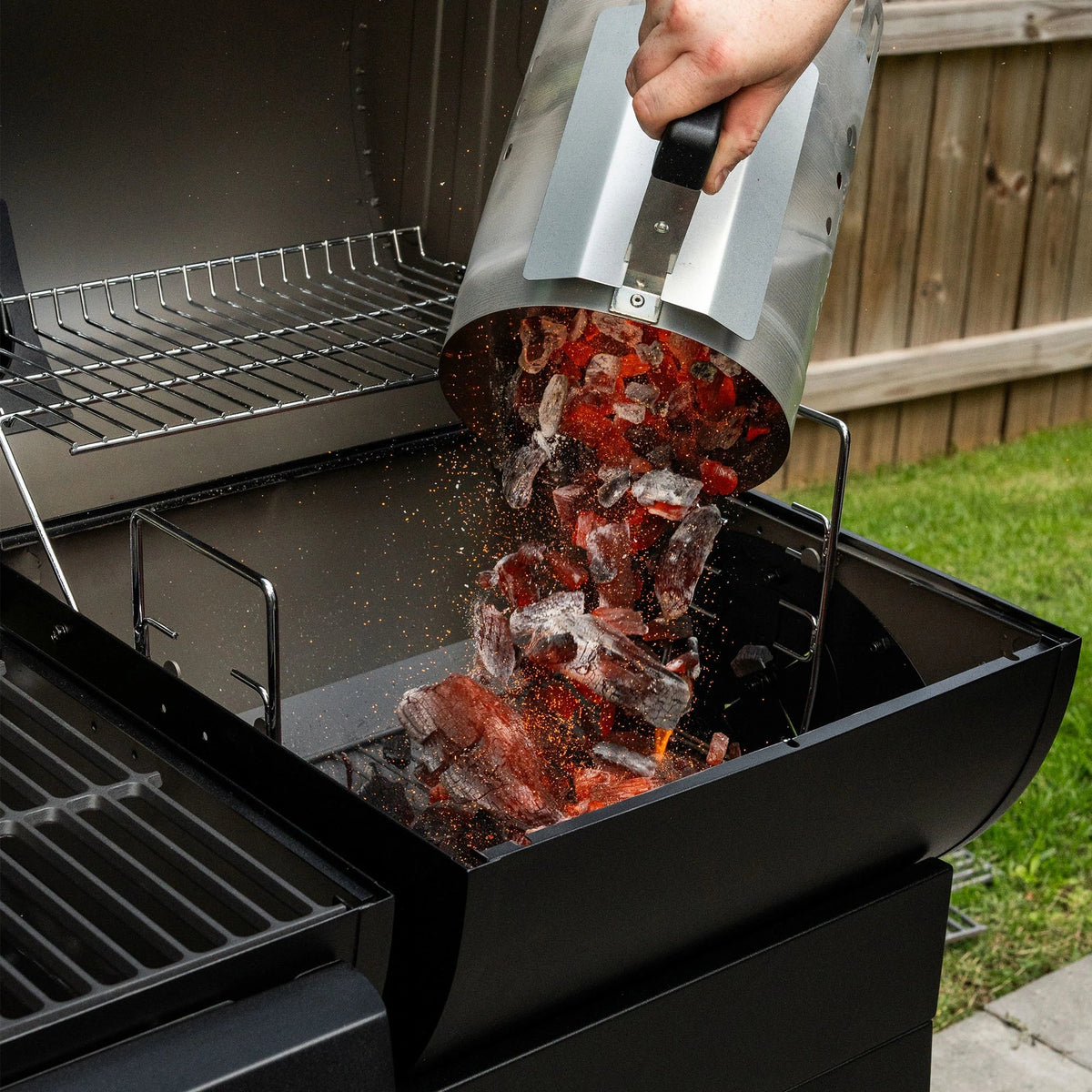 Char-Griller lump charcoal burning in a charcoal grill