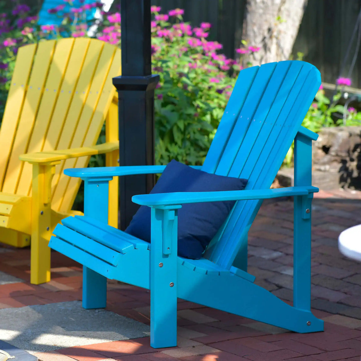 Luxcraft Blue and yellow Deluxe Adirondack chairs outdoors
