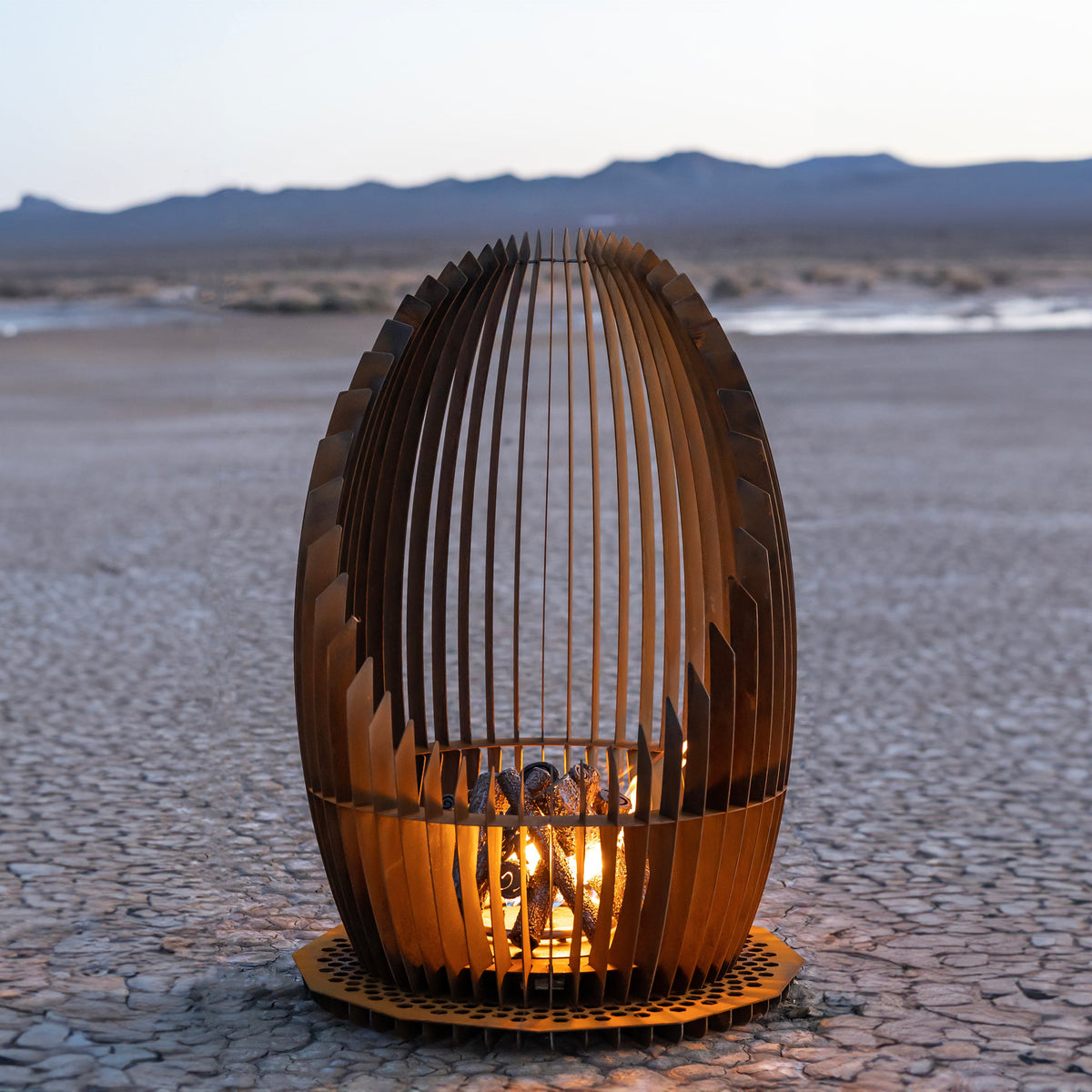 Manufacturer photograph of The Outdoor Plus Nebula Corten Steel Fire Sculpture - 30 or 36 Inch
