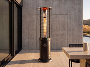 Lava Heat Italia Opus Lite patio heater in Hammered Black - outdoor setting