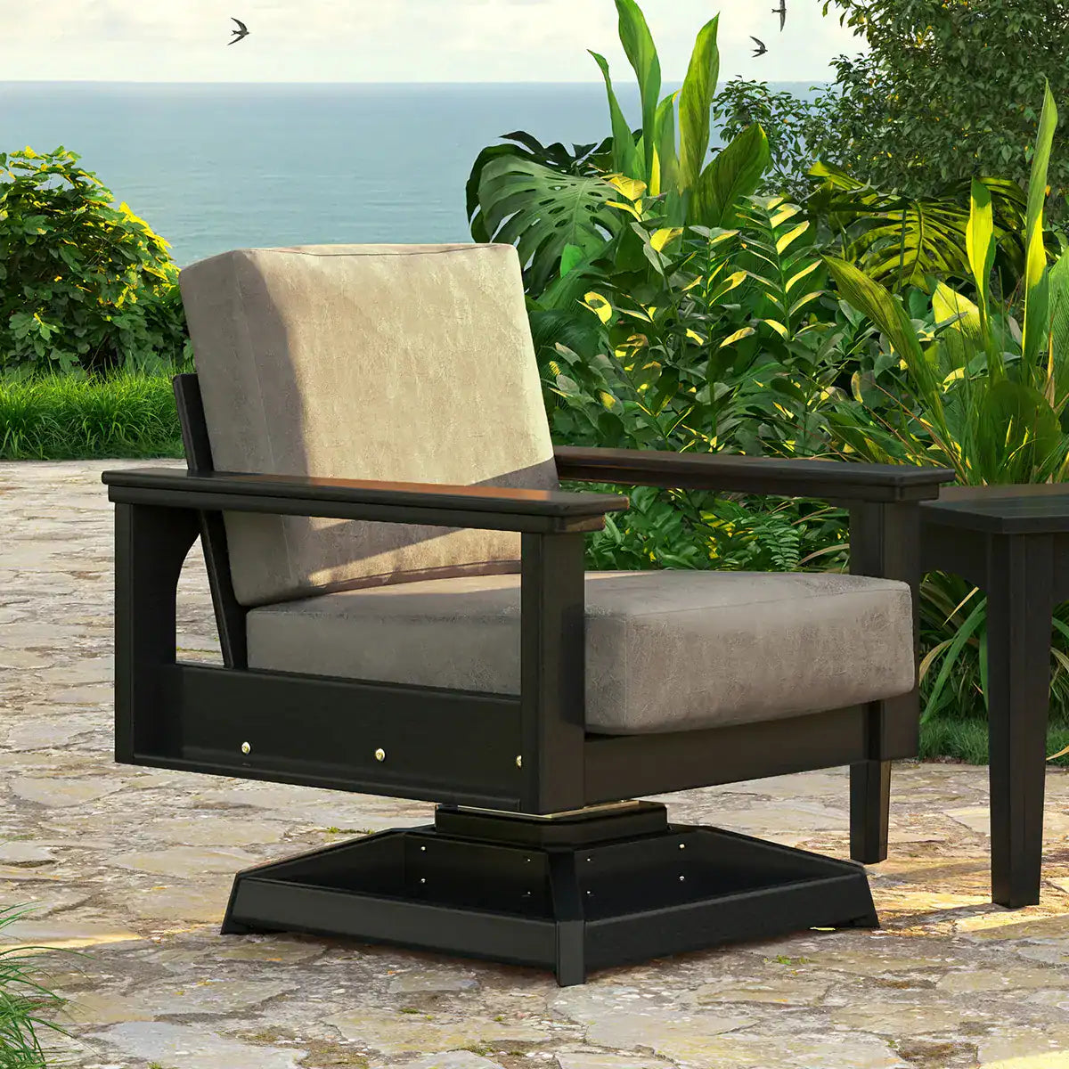 Luxcraft Lanai swivel rocker with dark frame and light cushions