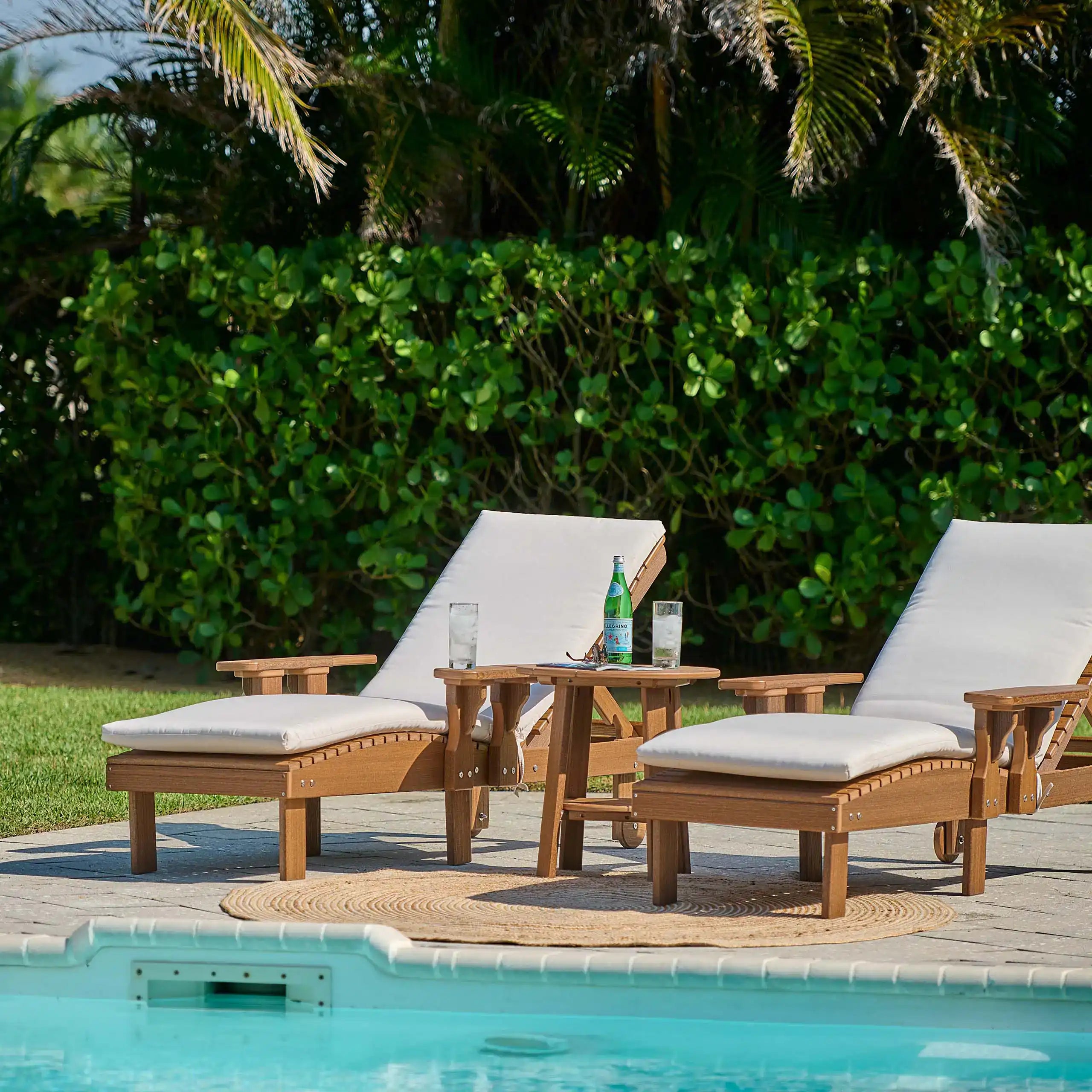 Luxcraft Lounge Chairs beside a swimming pool