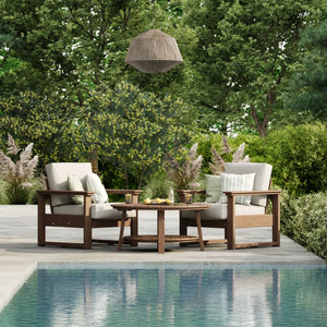 Luxcraft Lanai chairs arranged on a garden patio