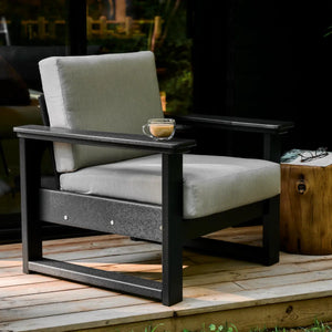 Luxcraft Lanai deep seating chair with dark frame and gray cushions