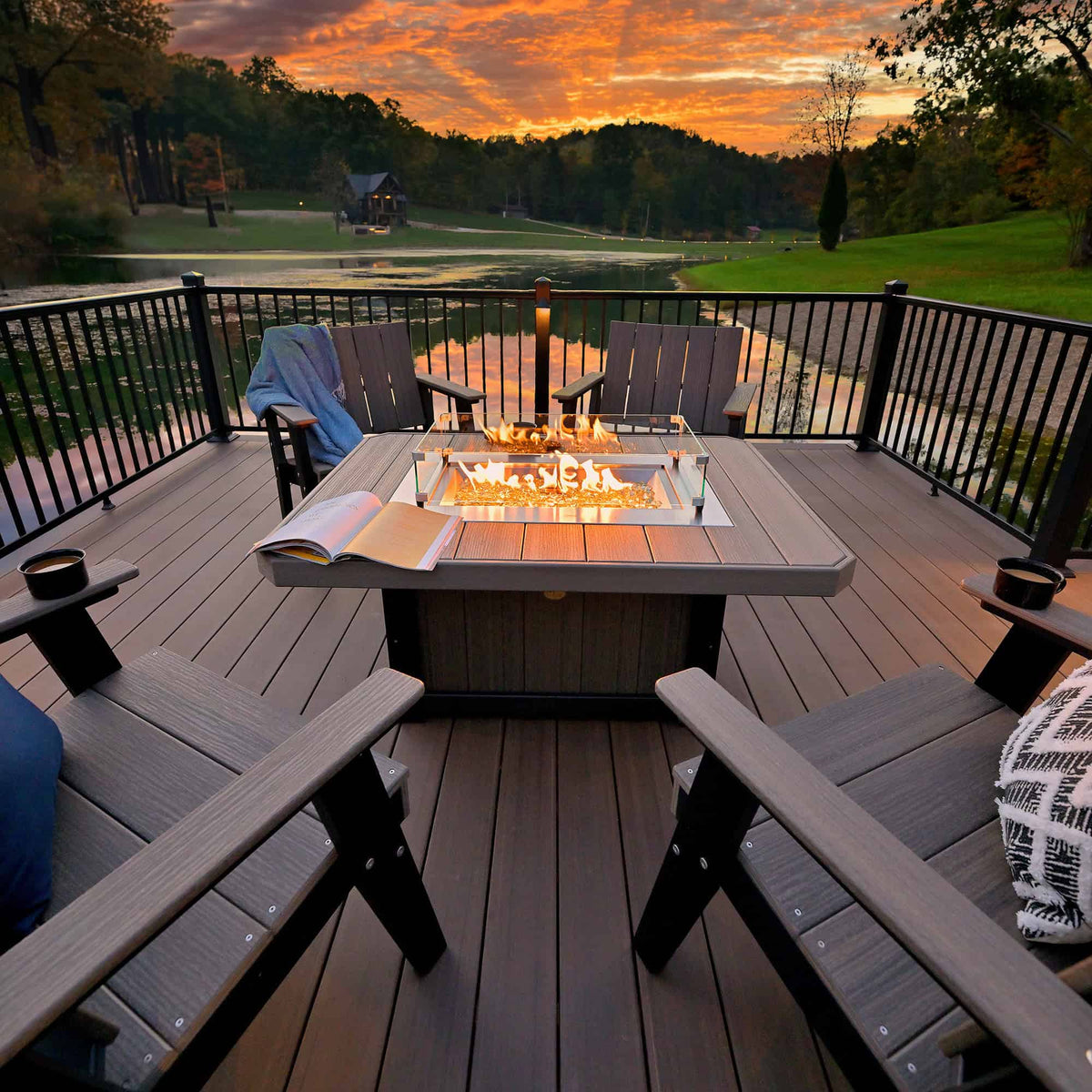 Luxcraft 51-inch Lumin rectangular fire pit on a deck at sunset