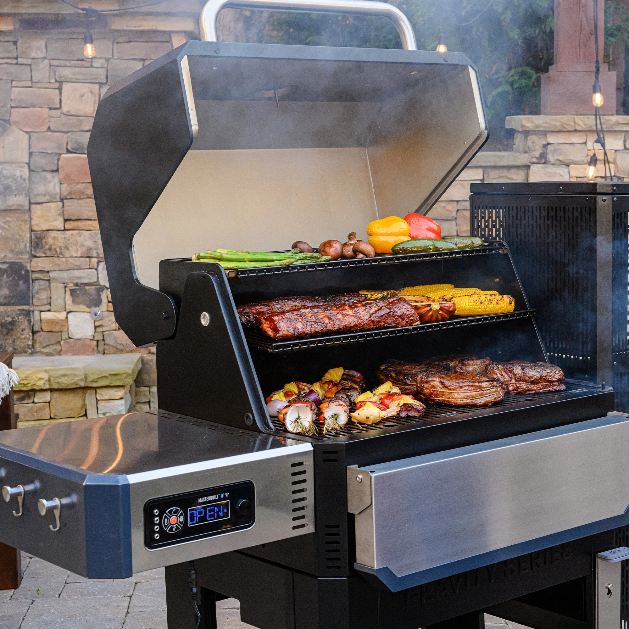 Masterbuilt Gravity Series 1050 Digital Charcoal Grill & Smoker used for outdoor cooking