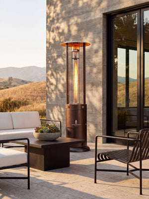 Lava Heat Italia Opus patio heater in Heritage Bronze - outdoor setting