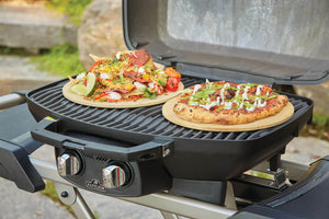 Napoleon TravelQ PRO285X Propane Grill with Scissor Cart - Napoleon portable outdoor grill product and lifestyle image