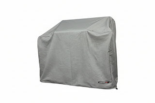 A gray cover protects the grill - smokeforges