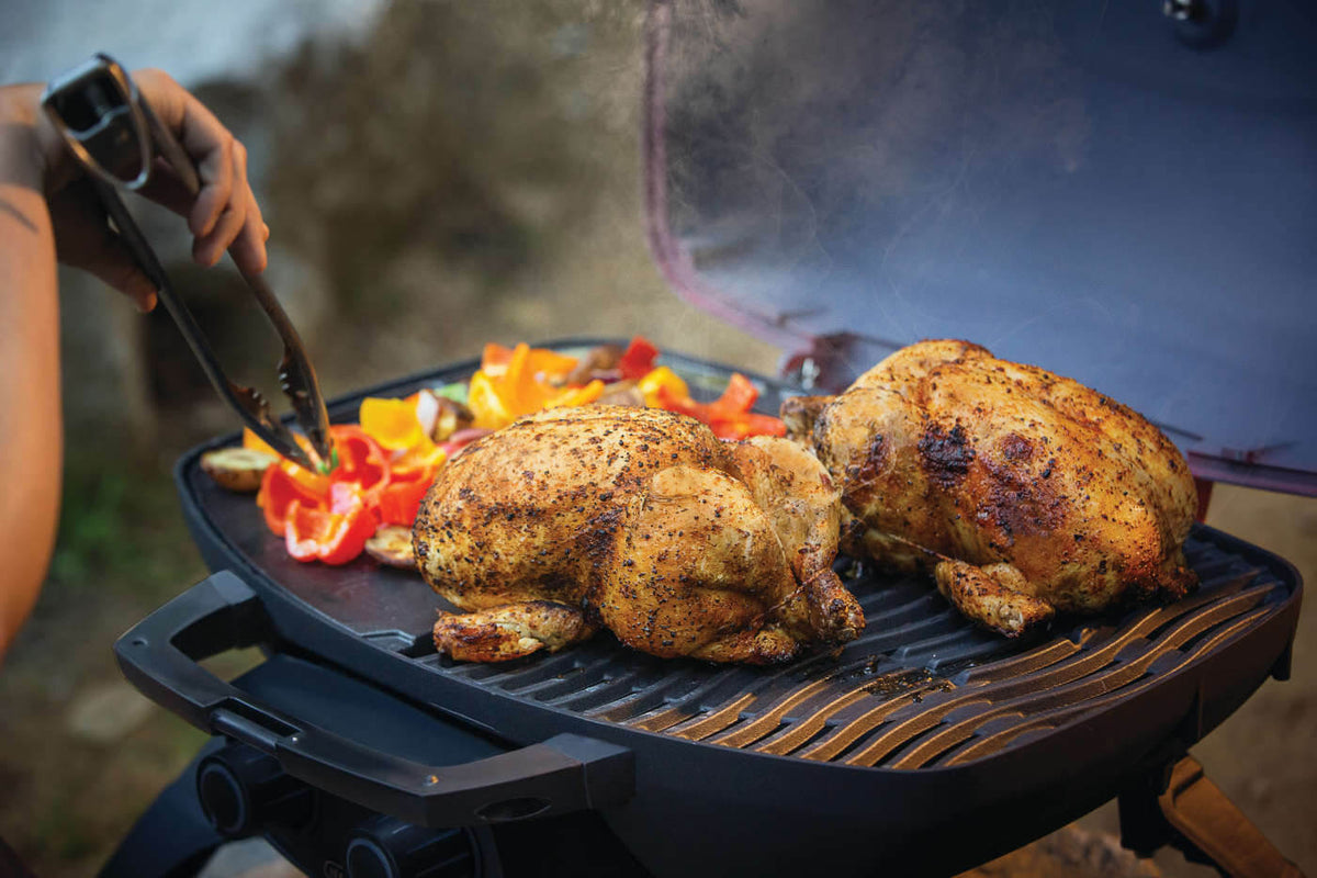 Napoleon TravelQ 285 Portable Propane Grill with Griddle - Red - Napoleon portable outdoor grill product and lifestyle image