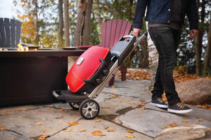 Napoleon TravelQ 285X Propane Grill with Cart & Griddle - Red - Napoleon portable outdoor grill product and lifestyle image