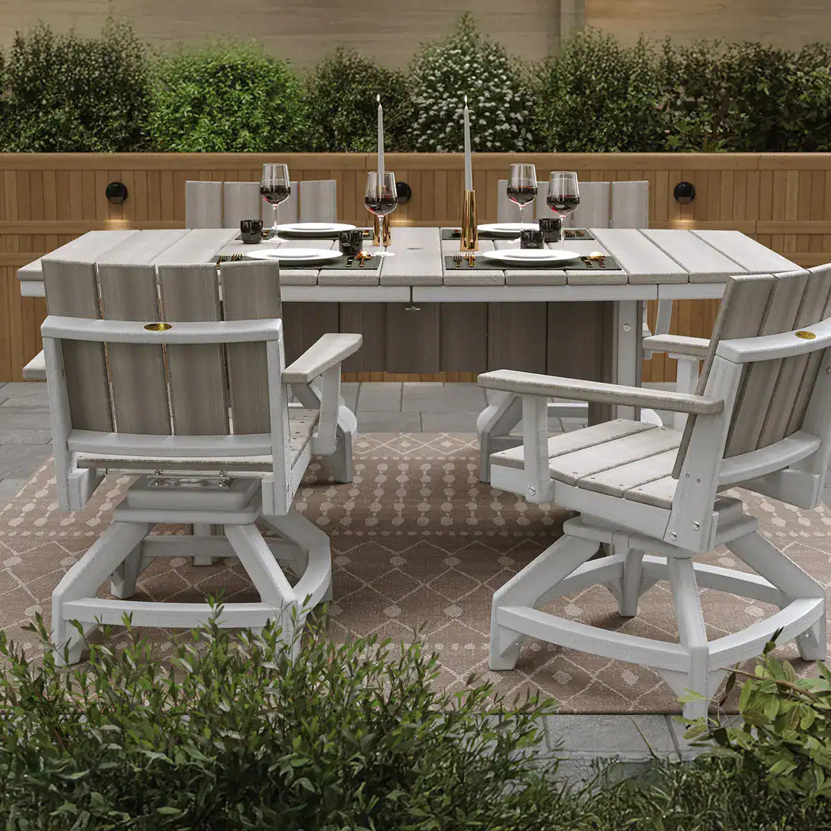 Luxcraft Oval Urban dining table with coordinating chairs outdoors