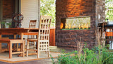 Majestic Lanai 48 see-through outdoor gas fireplace in a slab-stone wall