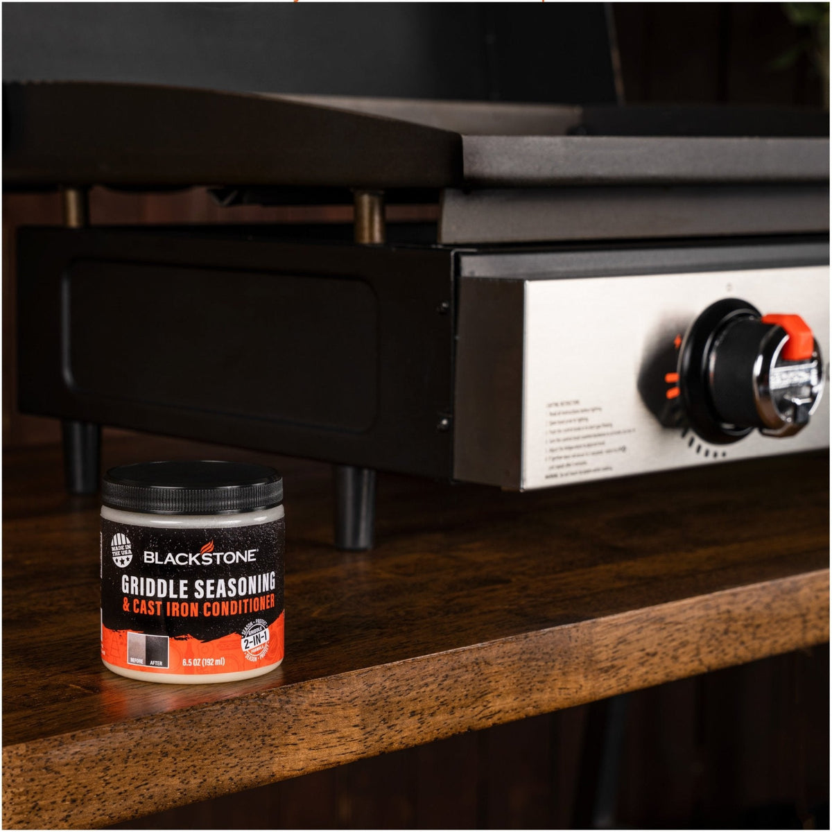 Blackstone Griddle Seasoning and Cast Iron Conditioner — conditioner beside a griddle