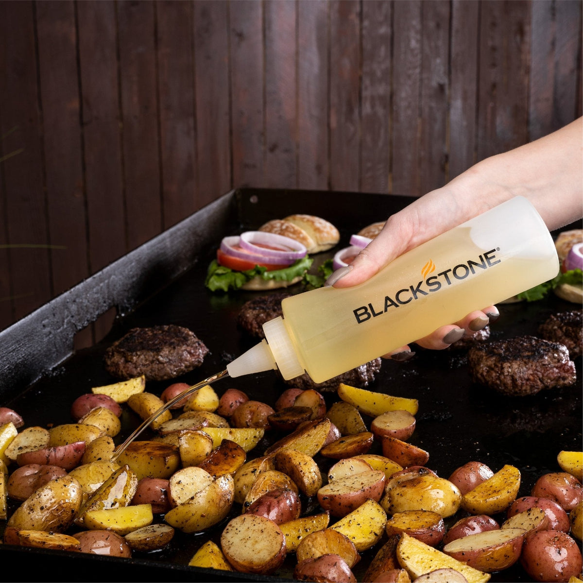 Blackstone Griddle Essentials Toolkit – 5 Piece — spatula in use