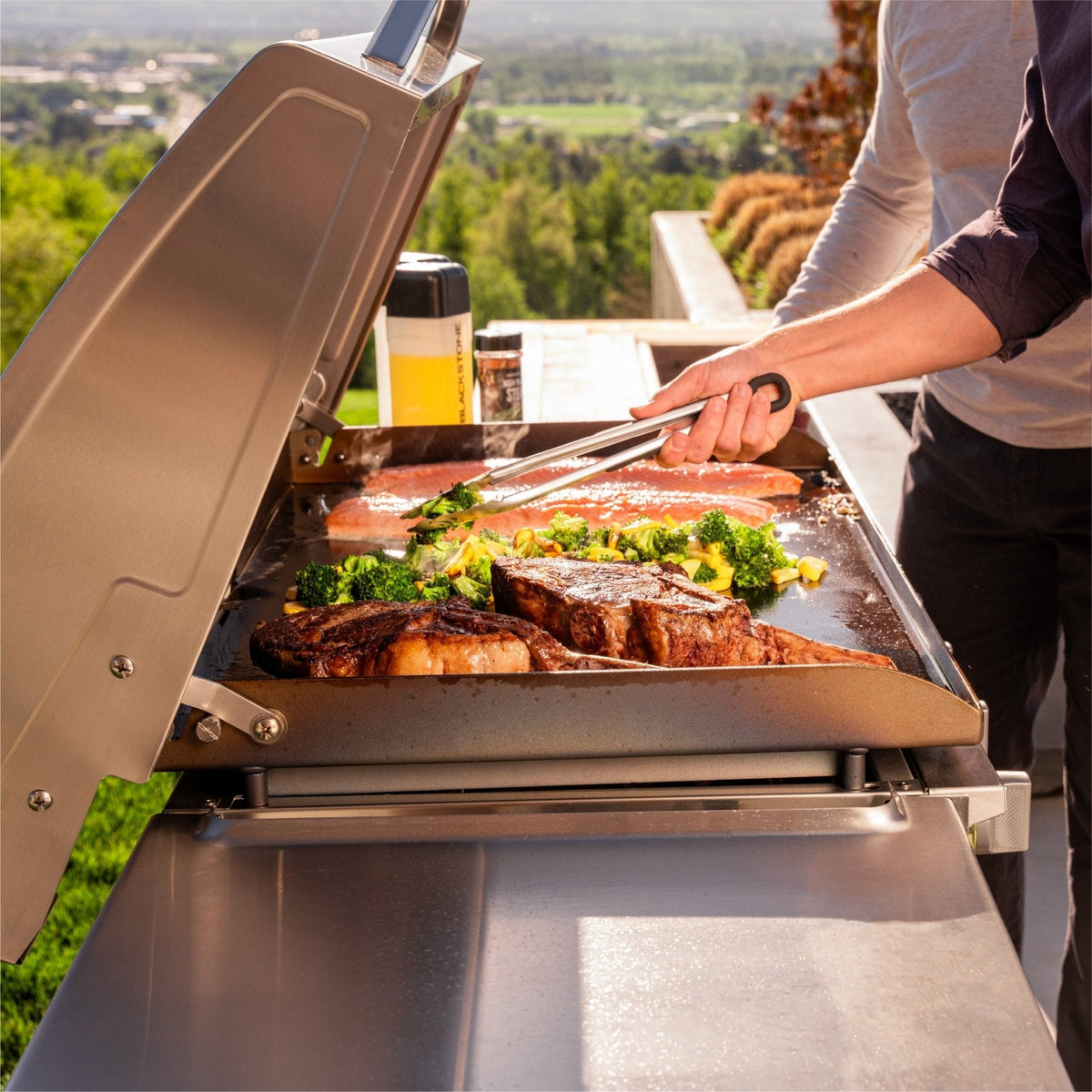 Blackstone Select 36-Inch Griddle with Cabinets — food preparation beside the griddle