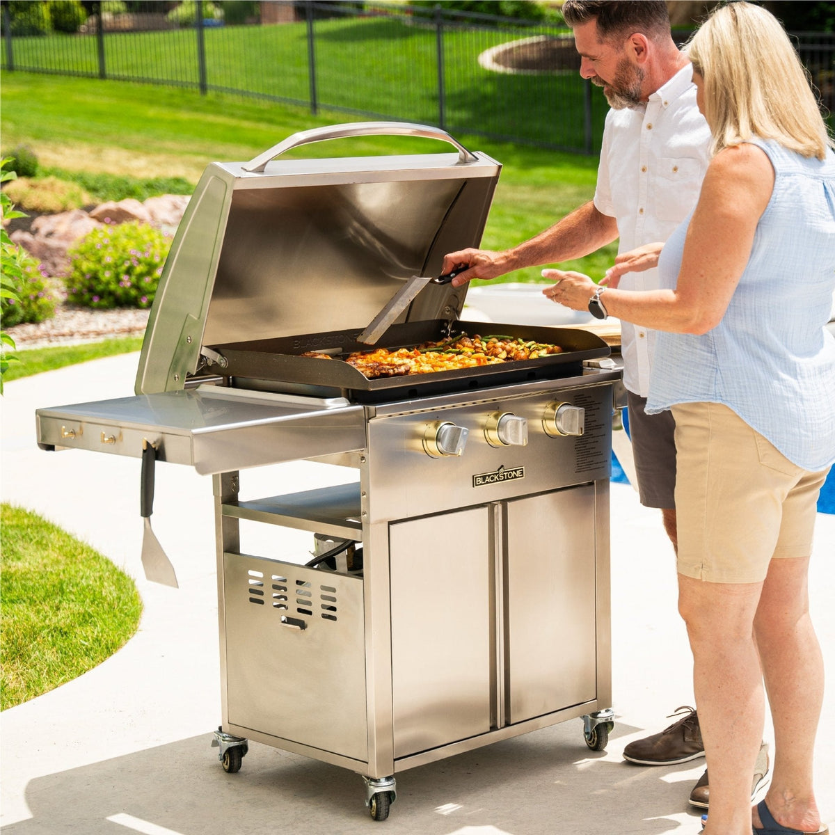 Blackstone Select 28-Inch XL Griddle with Cabinet — cooking at the griddle