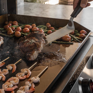Blackstone 30-Inch Electric Drop-In Griddle — food and spatula close-up